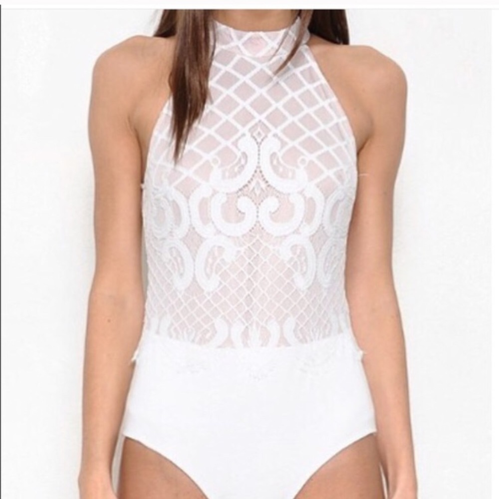 Elegant white lace bodysuit